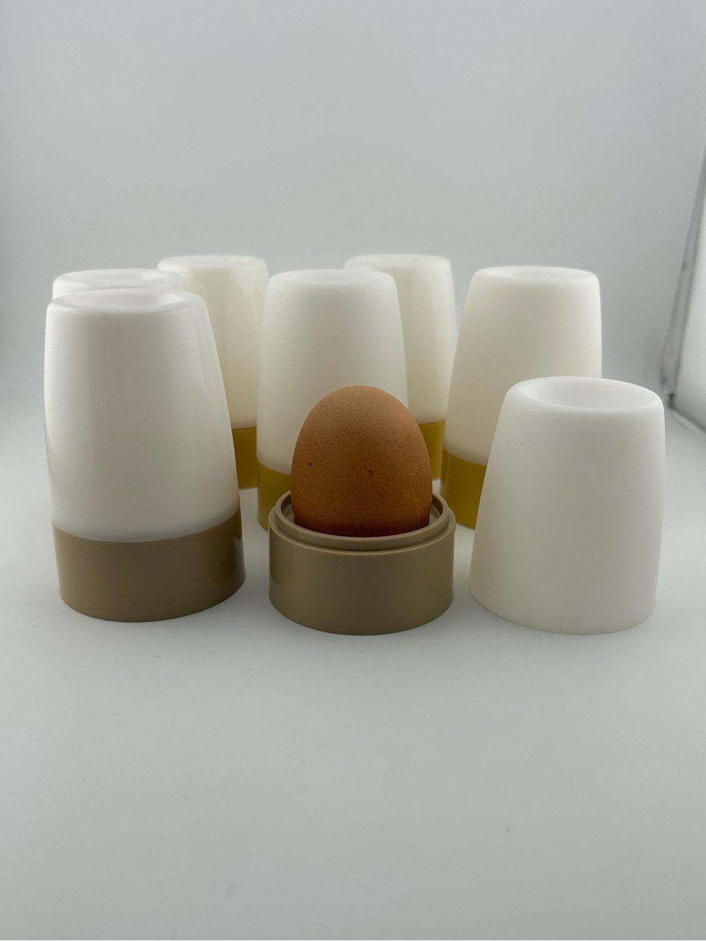 Set of 7 Vintage Tupperware covered egg cups